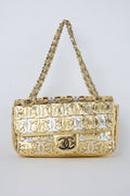 CHANEL CC CUTOUT GOLD METALLIC FLAP