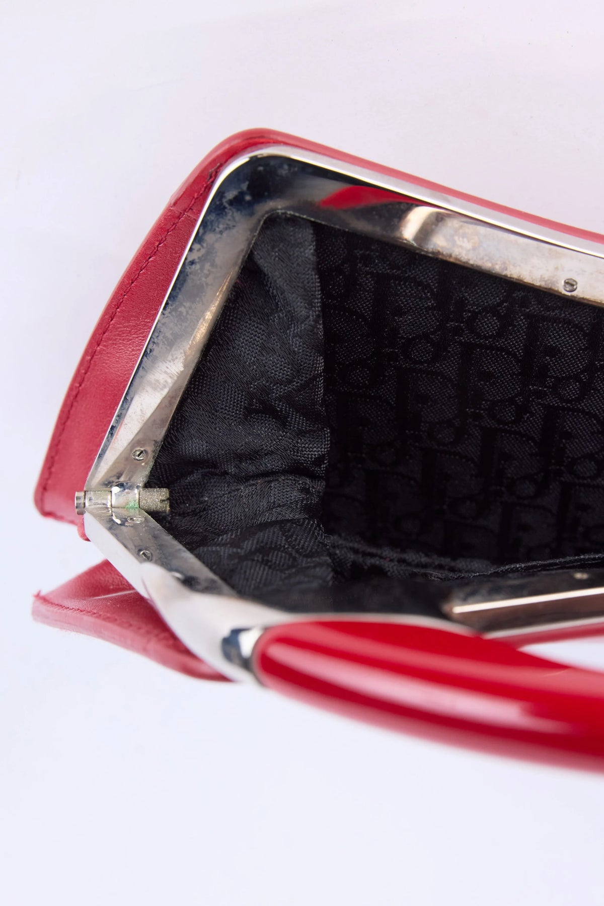 RARE DIOR RED BONDAGE CLUTCH