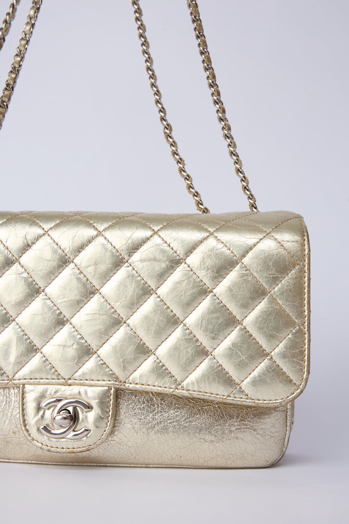 CHANEL METALLIC ACCORDIAN FLAP