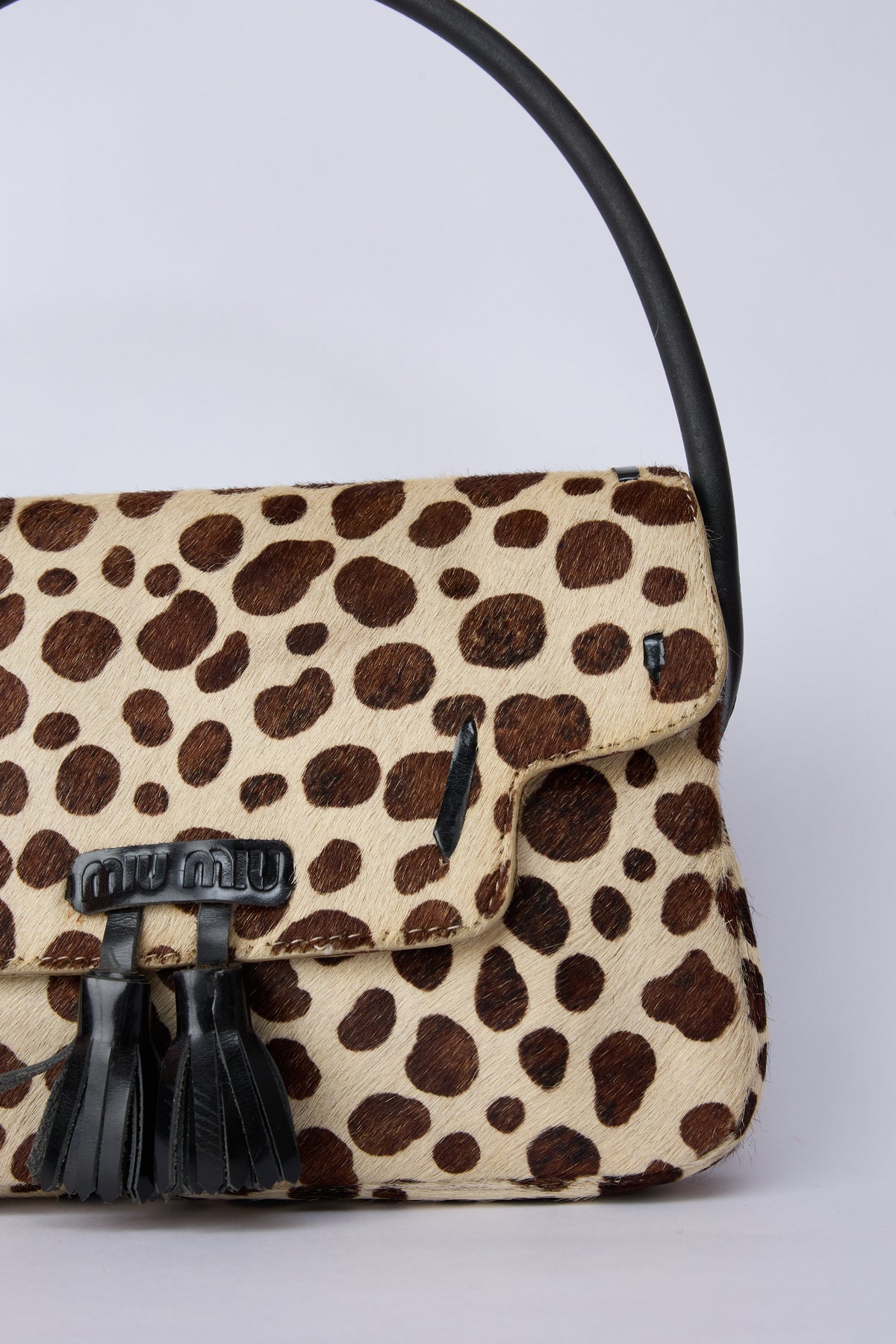 MIU MIU SPOTTED PONY HAIR TOP HANDLE BAG
