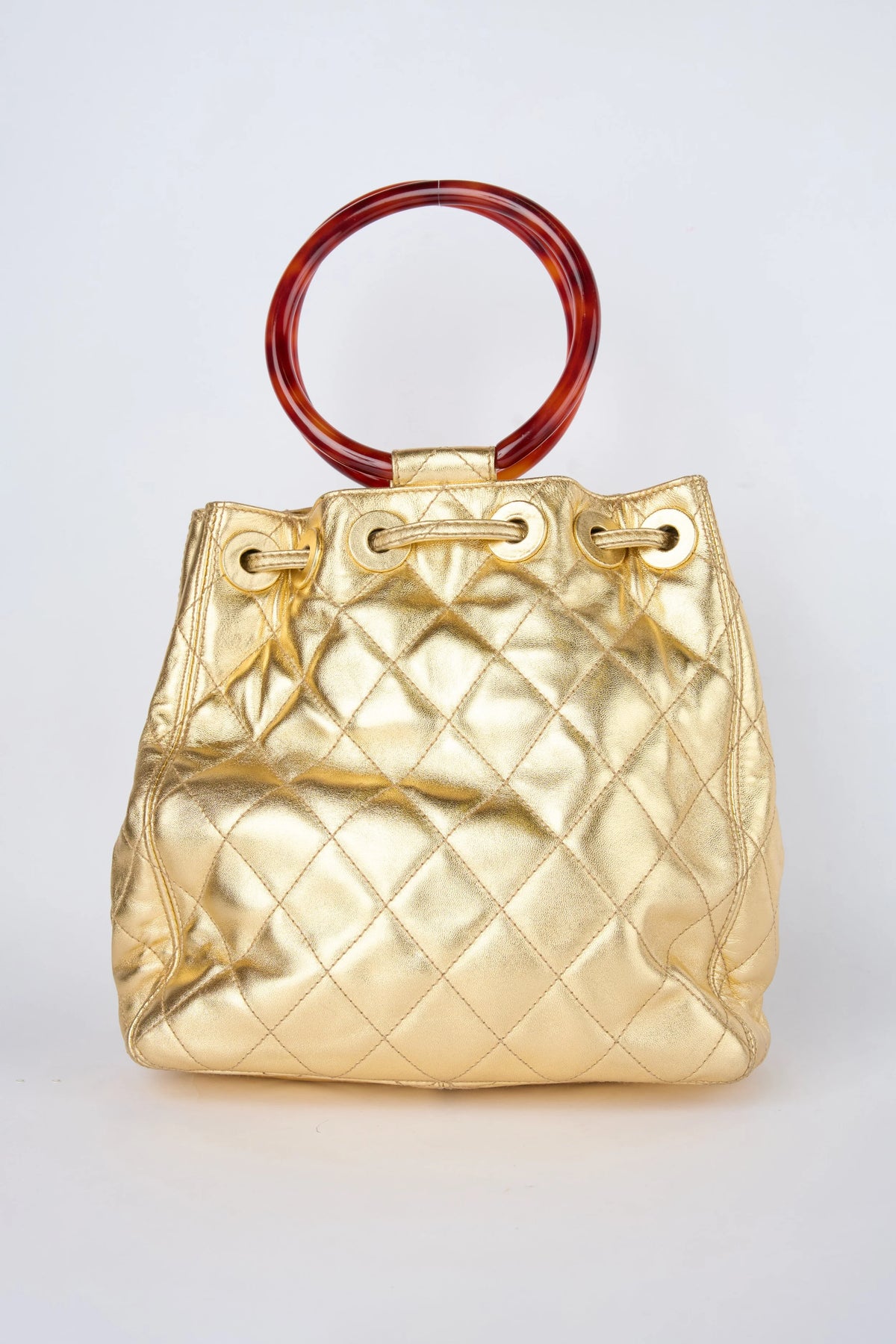 CHANEL CHAMPAGNE GOLD HOBO BUCKET